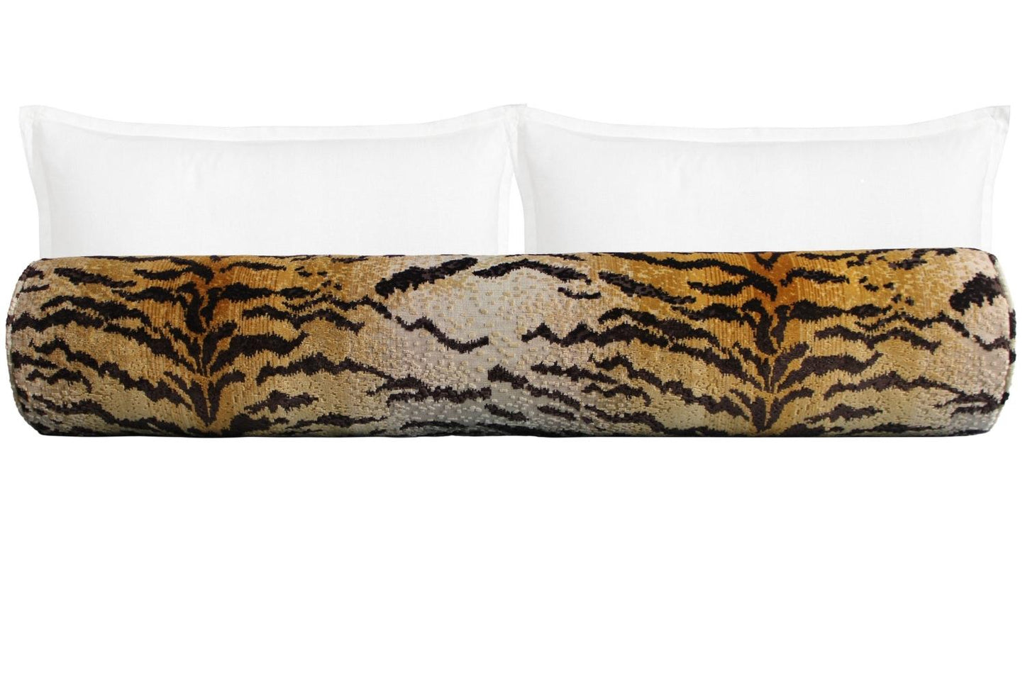 Tiger-striped bolster pillow with white pillows on a white background